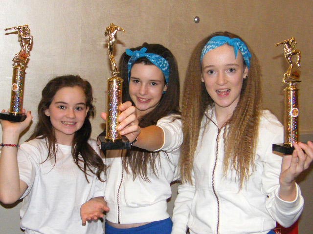 L to R: Ciara Connolly, Katie O'Flynn and Amy Brophy, members of Dance Revolution with their trophies